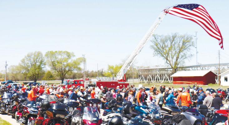 Photo by Haley Spotanski HUNDREDS OF PEOPLE turned out for the Kyle Petty Charity Ride Across America’s pit stop at the Howard County Fairgrounds on Sunday at lunchtime.