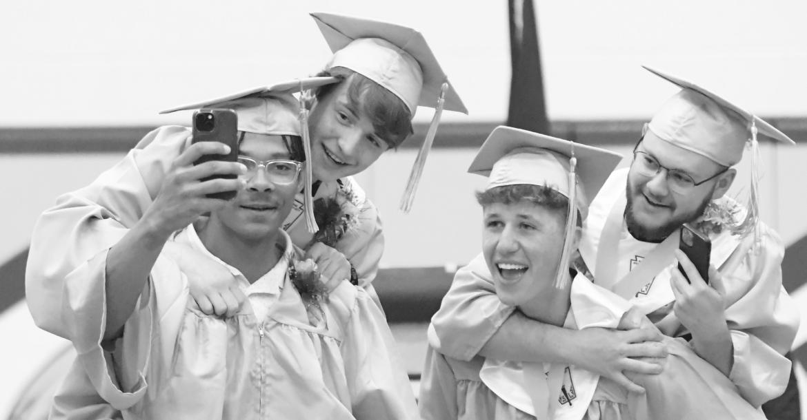 CELEBRATING with a selfie at the end of Sunday’s graduation ceremony were Christopher Thomas, Spencer Koperski, Shane Kosmicki, and Maximilian Hueftle. Photos by Michael Happ