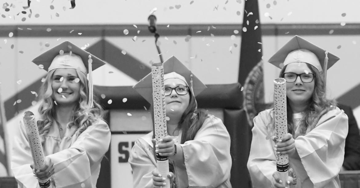 CONFETTI FLEW as Jada Alberti, Madison Harrahill, and Abby Hirschman made their exit from the gymnasium following Sunday’s ceremony.