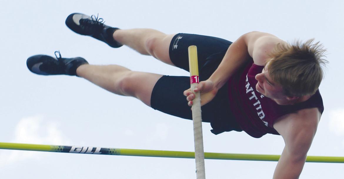 CENTURA’S CALVIN ZIMMERMAN cleared 13-00 to place second in the boys’ pole vault last Thursday. Zimmerman qualified for this week’s Class C state track meet in Omaha. Photo by Michael Happ