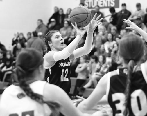ALEXIS JOHNSON goes up for two points during last Tuesday night’s game between Central Valley and Pleasanton. Johnson had six points in the contest. Photo by Jordan Coslor
