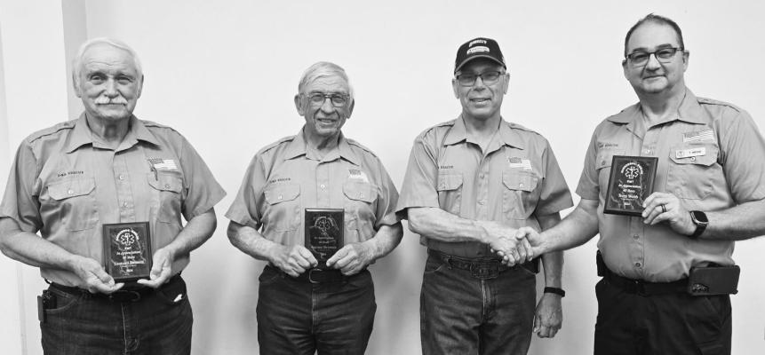 THE DANNEBROG/BOELUS EMTS recently recognized three members for their years of dedication to emergency service in the community: Leonard Reimers, Jerome Reimers, and Terry Webb. Each member has dedicated forty years of service to the organization. Wayne Reimers, who has over thirty-six years of service, presented all three with plaques. The four volunteers, pictured above, have been serving the community as members of the fire department and rescue squad for a total of 156 years. Courtesy Photo