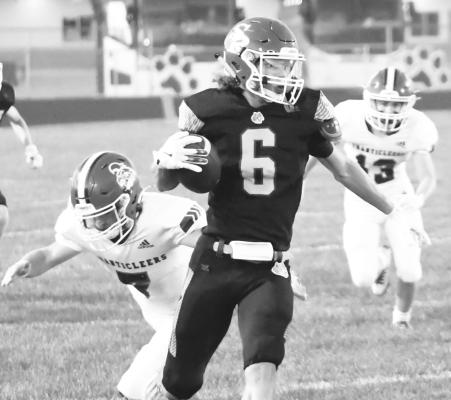 ST. PAUL junior Zandyn Weller weaves past a series of Ord defenders during a kickoff return on Friday. Weller’s touchdown would be negated by a penalty, but provided the spark St. Paul needed to get on the board. Photos by Jordan Coslor