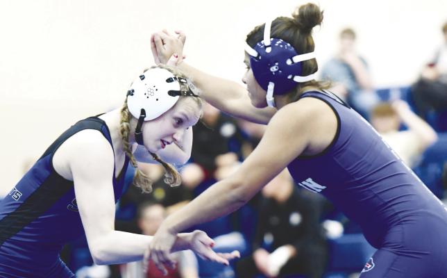 ALEXIS GALUSHA battled Amillionna Reyes in last Thursday’s triangular at Gibbon. Galusha pinned the Buffalo in sixty-six seconds. Photos by Jordan Coslor