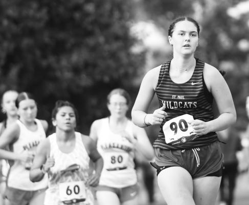 ST. PAUL’S KATIE KLEINSASSER is pictured competing at the Gibbon Invite earlier this season. Kleinsasser placed twelfth at last week’s Centura Invite, leading the Wildcats’ girls’ team. Photo by Jordan Coslor