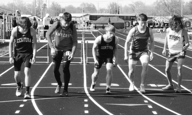 CENTURA’S Alec Plate and Zavery Jensen race away from the starting line in the boys’ 800-meter run last week. The Centurions placed ninth and sixth, respectively in that race. Photos by Monte Steele