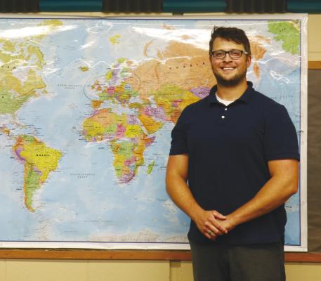 DEVIN SOLKO, a 2011 graduate of St. Paul High School, returned to the district this year as an educator and coach. Photo by Michael Rother