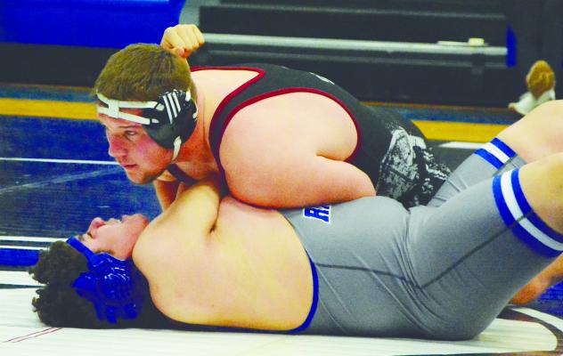 CENTURA’S Kolten Simons pinned Ravenna’s Jesse Washington during last Thursday night’s quadrangular at Ravenna High School. The Centurion locked up the Bluejay in forty-nine seconds. Photo by Monte Steele