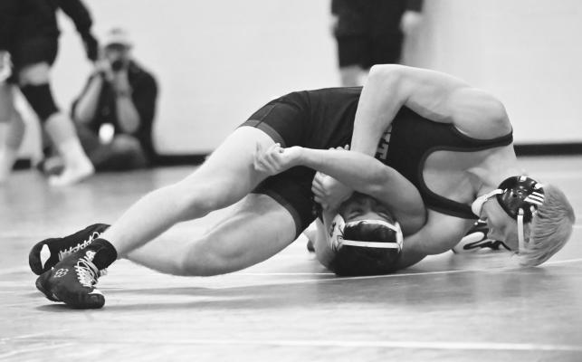 DILLON FANTA pinned Wood River’s Bryan Flores in the second period of the semifinal round of Saturday’s LouPlatte Conference Wrestling Tournament. Photo by Michael Happ