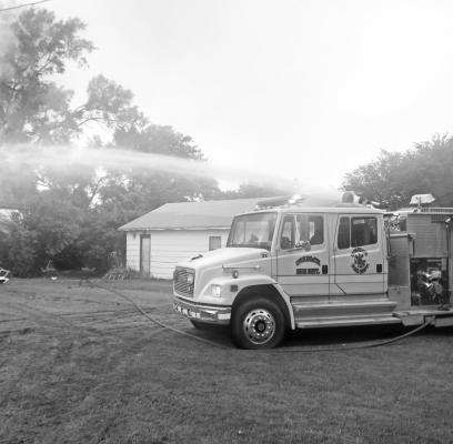 FIRE DESTROYS WOLBACH