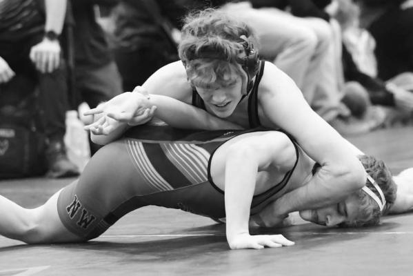 KALEB BAKER rolled past Grand Island Northwest’s Gavin Ruff with a 9-0 major decision during the quarterfinal round of the Central City Invite. The Wildcats placed seventh at the Bison’s meet.