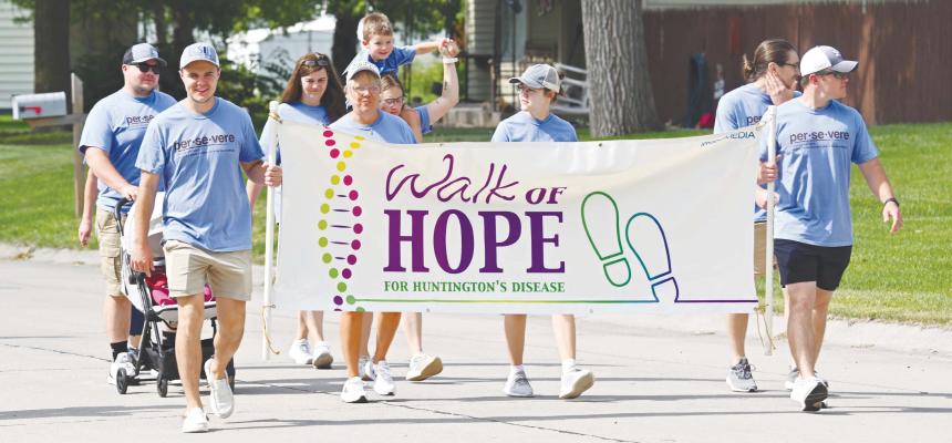 THE TWELFTH ANNUAL WALK OF HOPE for Huntington’s disease took to the streets of St. Paul on Saturday morning, marking the second time the event was held in Howard County. A large crowd participated in the event, which was held at the Sts. Peter and Paul Catholic Church Parish Life Center. Photo by Michael Happ