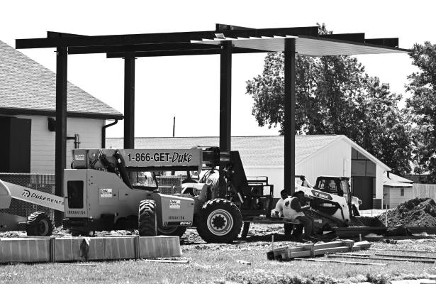 THE SUPERSTRUCTURE for the new diesel canopy at Casey’s General Store’s St. Paul location—1013 Second Street— went vertical on Monday morning. The corner of Third and Kendall streets in St. Paul has been an epicenter for construction this summer, with contractors tackling a commercial project on the southwest corner of that intersection as well. Photo by Michael Happ
