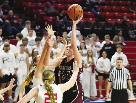 KENNEDY DAVIS rises above two Pender defenders and hooks the ball into the basket for two of her twelve points in Centura’s 42-31 loss to the Pendragons last Wednesday. Photos by Jordan Coslor