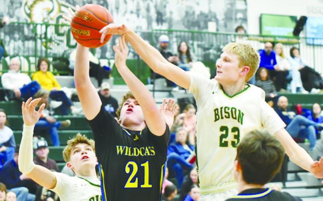 CARTER HAWLEY battles to the rim during the Wildcats’ game against Central City last Tuesday night in the Bison Activity Dome. The Wildcats beat the Bison 69-45 to improve to 5-8 on the season. Photos by Jordan Coslor