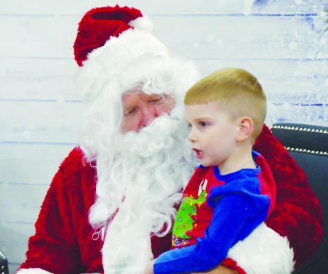 SANTA STOPS IN ST. PAUL