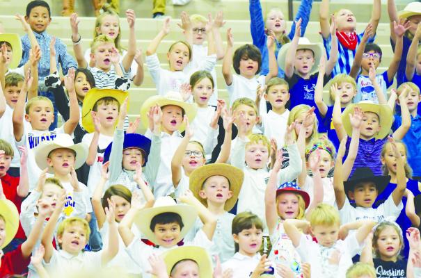 ST. PAUL students in kindergarten, first, and second grades performed “This is My Country” during last week’s Veterans Day program at St. Paul Public Schools. Photos by Michael Happ
