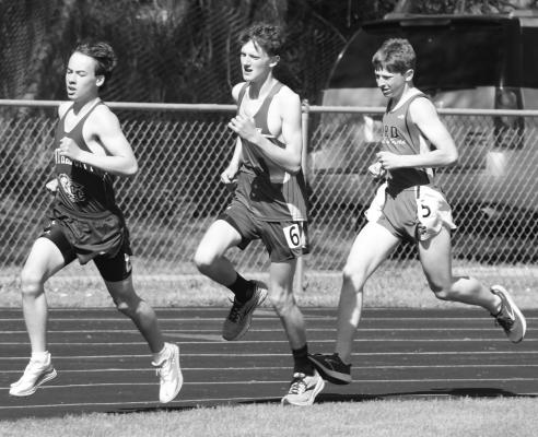 AIDAN LUKASIEWICZ placed sixth in the 3200-meter run in 12:12.57 during last week’s Ord Invitational track meet. Photos by Michael Happ