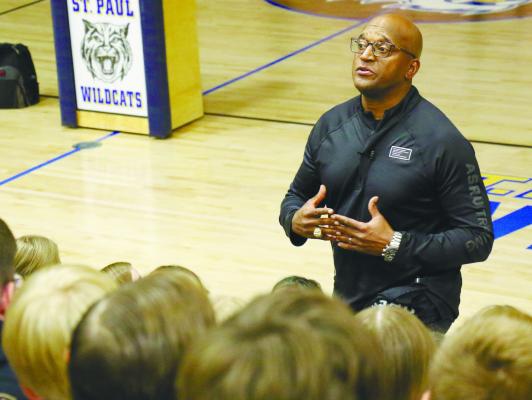 AARON DAVIS, a former member of the Nebraska Cornhusker football team, spoke to students at St. Paul Public Schools last Wednesday. Photo by Michael Rother