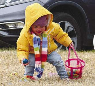 KIDS OF ALL AGES braved the chilly weather to gather eggs during the chamber’s annual Easter Egg Hunt on Saturday morning.