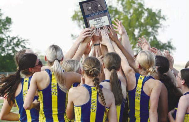 MEMBERS of the St. Paul girls’ track team secured the District C-6 team title during last Thursday’s district meet at Boone Central High School. The Wildcats scored 105 points to top the leaderboard, beating the girls from Nebraska Christian by six points. Photos by Jordan Coslor