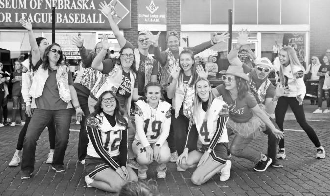 ST. PAUL faculty, staff, coaches, and members of the 2024 Wildcat Dance Team performed a spirited routine to the tune of Dancing Queen during Friday’s homecoming pep rally in downtown St. Paul. A large crowd attended this year’s homecoming festivities on Howard Avenue. Photo by Michael Rother