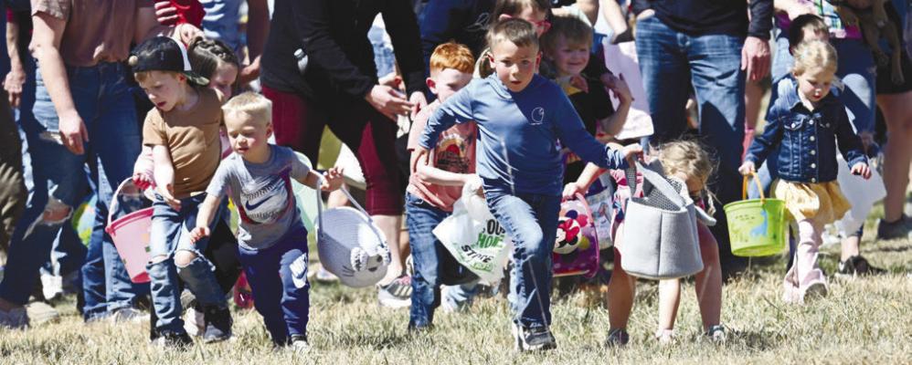 HUNDREDS OF KIDS participated in the fifth annual Broedy Starkey Memorial Easter Egg Hunt in northeast Howard County on Sunday afternoon. This year marked the first time in the hunt’s five-year history that over 10,000 eggs were hidden for the event. Photos by Michael Happ