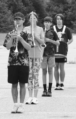 Photo by Michael Rother MEMBERS of the Centura High School Marching Band stand at attention last Friday during the morning session of district’s annual band camp.