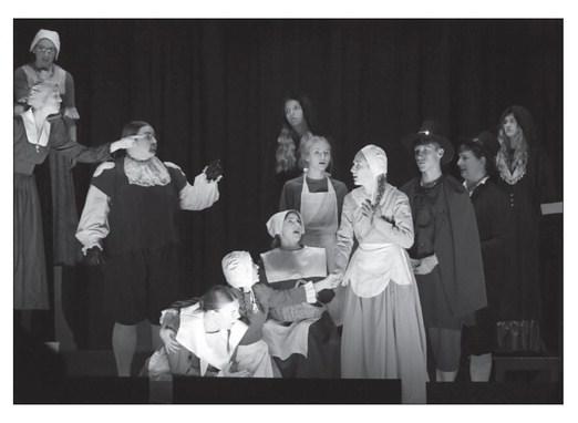 AS HYSTERIA GRIPS SALEM, Joanna Nurse (Emma Corman) finds herself among the accused. Pictured in this scene are, foreground, Alexis Johnson, Piper Shepard, Nevaeh Klemptner and Emma Corman; middle, Annaka Wood, Jenna Baker, Taylor McIntyre, Landon Shoemaker, and Thayer Davis; and back, Laretta Davis, Kinley Nelson, and Maddie Clark.