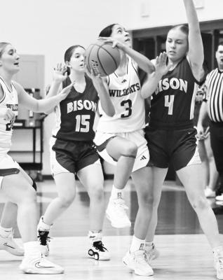 ST. PAUL’S Zaya Lewis attempts to rise above the Central City defense for a bucket last Tuesday night during the Wildcats’ game against the Bison in St. Paul. Photos by Jordan Coslor