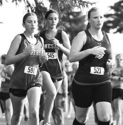 LONNA PATRICK battled in a pack of runners at last week’s Ron Priebe Invite at Gibbon. Patrick finished the race in forty-seventh. Photo by Jordan Coslor