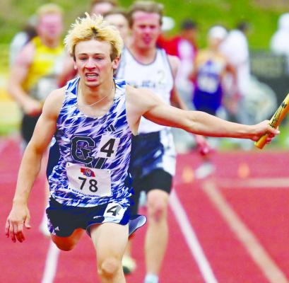 CENTRAL VALLEY’S BOSTON WOOD strides across the finish line at the end of the Class D boys’ 1600-meter relay at Omaha Burke Stadium on Saturday. The Cougars’ relay team of Zaden Wolf, Lane Foltz, Jairo Lazos, and Wood set a new state and state meet record in the event, finishing the relay in 3:26.62 for the gold. Photos by Michael Happ