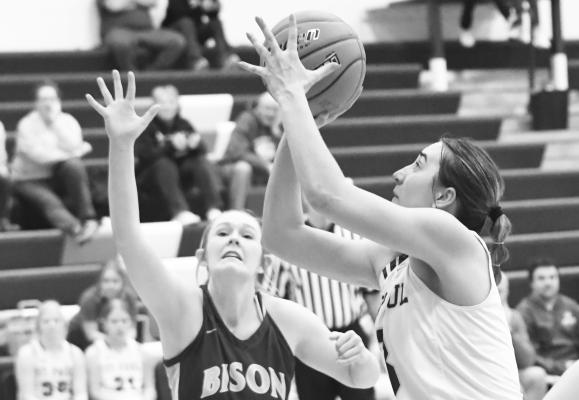 CLARA KUNZE squares up for a shot during one of last week’s LouPlatte Conference consolation games. Kunze had twelve points opposite Central City on Friday. (Jordan Coslor)