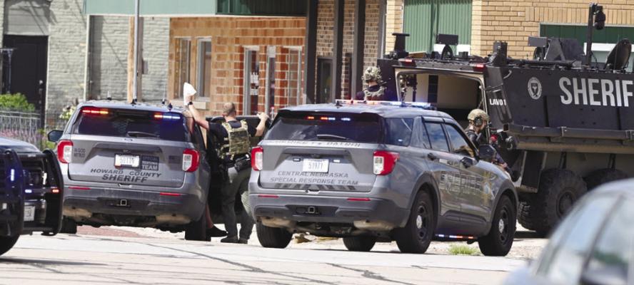 MEMBERS of Central Nebraska Special Response Team assisted the Howard County Sheriff’s Office in serving a search warrant at 704 7th Street on Sunday afternoon. Photos by Michael Happ