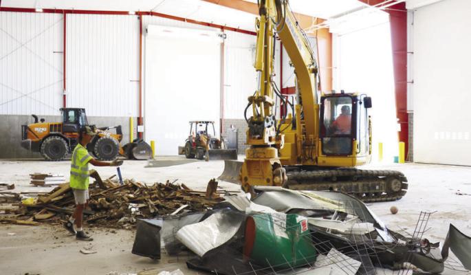THE NEW RECYCLING FACILITY at the Loup Central Landfill has already started to achieve its goal of providing employees a controlled environment to sort materials and help extend the life of the landfill’s municipal solid waste cell. Photos by Michael Rother