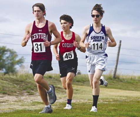 CENTURA’S KASEN WEBB moved towards the front of the pack during the boys’ race at last week’s Ravenna cross country invitational. Webb placed twenty-fifth in the meet. Photo by Michael Happ