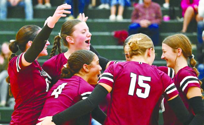 MEMBERS of the Centura girls’ volleyball team celebrate a point during the second set of last Thursday night’s LouPlatte Conference battle against Central City. The Centurions won the match 3-1. Photos by Michael Happ