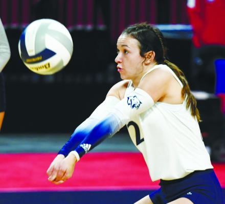 CENTRAL VALLEY’S Piper Shepard digs up a shot from across the net on Thursday morning at Pinnacle Bank Arena in Lincoln.