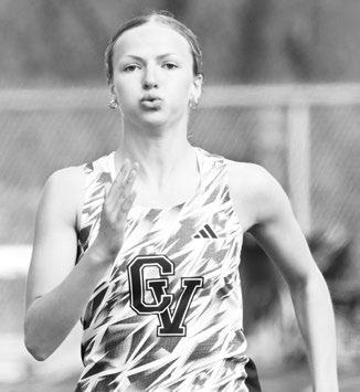 CENTRAL VALLEY’S TAYLOR MCINTYRE battles to the line in the 200-meter dash on Thursday. McIntyre won that race in 23.03. Photo by Michael Happ
