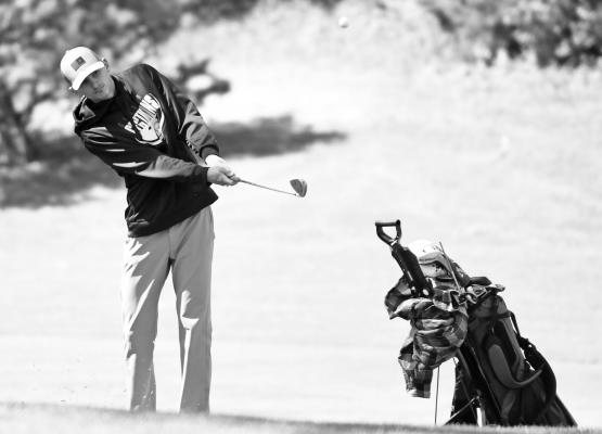 WESTON KROEGER navigated the terrain at Meadowlark Hills in Kearney last week. The Centurions finished Kearney Catholic’s meet sitting in eleventh place. Photos by Jordan Coslor