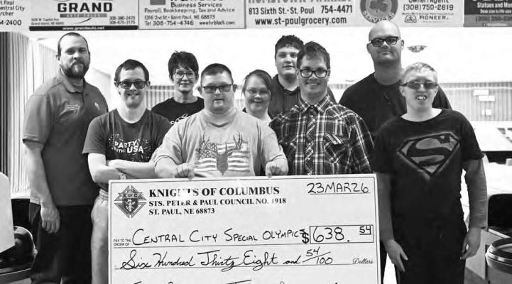 KNIGHTS OF COLUMBUS COUNCIL 1918 recently made a donation to the Central City Special Olympics. The donation was the result of the Knights’ recent tootsie roll drive. Pictured during the check presentation on Monday are (back row): Travis Sydzyik, Crissy Bader, Holly Busse, Bobby Rice, and Daniel Ford; (front row): Andrew Gorecki, Wyatt Bader, Kenneth Jones, and Ethan Wert; (not pictured): Jacie Rice, Alan Benner, and Logan Wert. Photo by Michael Happ