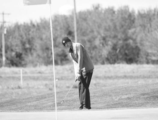 MADDOX QUINN chips on to the green during last Friday morning’s Centura Invite. Quinn placed fourth at the Centurions’ meet after he carded an seventy-nine at Centura Hills. Photo by Jordan Coslor