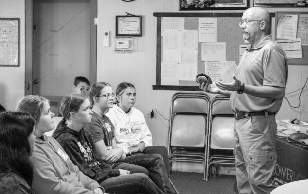 ALAN BARTELS, the Information and Education Coordinator for the Lower Loup Natural Resources District, talks turtles—a common snapping turtle, specifically – during a presentation in Ord. Eight of Nebraska’s nine native turtle species live most of their lives in streams, wetlands, lakes, water-filled ditches—and in the case of snapping turtles and painted turtles—even sewer ponds. Courtesy Photo