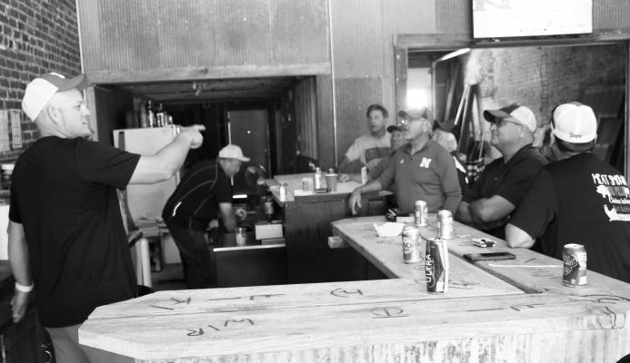 SONS OF THE AMERICAN LEGION SQUADRON 236 held a fundraiser in the old bar on main street in Wolbach on Friday and Saturday of Labor Day weekend. Pictured above, SAL Adjutant Luke Thompson and Member Jess Rother tend bar on Saturday. Photo by Michael Rother