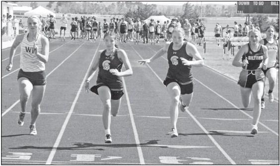 CENTURA’S Lauren Suntych and Hailey Marr battle the line in the girls’ 100-meter dash on Thursday afternoon, Suntych won that race in 13.28. (Monte Steele)