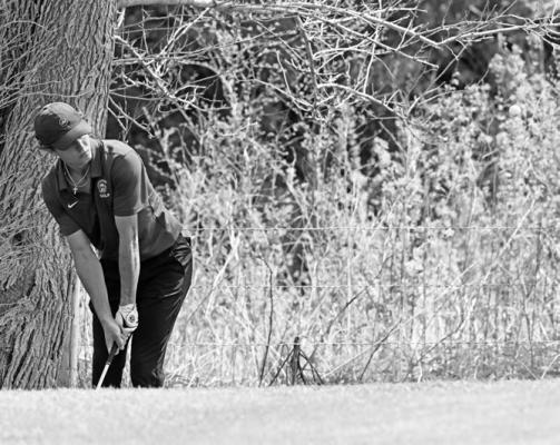 CENTURA’S JACK HADENFELDT chips onto the third green at the St. Paul Country Club last Thursday afternoon. The Centura golfer finished the St. Paul Wildcats’ home meet after firing an eighty-one to finish in twelfth place. Photo by Michael Happ