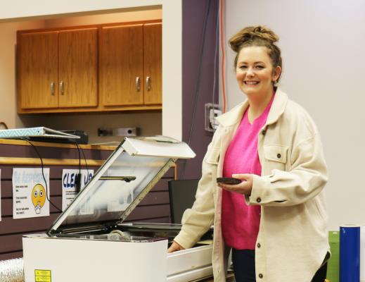 AUBRIE BROWN makes use of the Glowforge in the St. Paul Library’s MakerSpace to make Christmas ornaments on Wednesday, December 21st. In 2023, Brown will be continuing her position as library director remotely. (Michael Rother)