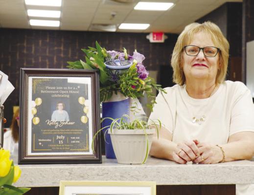 KELLY SCHEER was honored with a retirement open house at Citizens Bank &amp; Trust Co. in St. Paul last Wednesday. Scheer had been in banking for nearly five decades prior to her retirement. Photo by Michael Rother