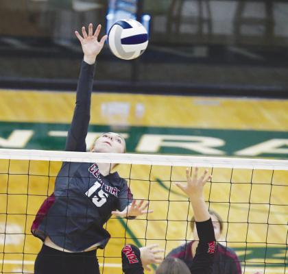 CENTURA sophomore Ella Rasmussen goes for a kill from the right pin during last Thursday evening’s consolation match of the LouPlatte Conference Tournament. Photo by Michael Happ