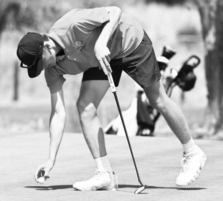 ST. PAUL’S JACKSON WEGNER lines up his putt during last month’s St. Paul Invite. Wegner finished last week’s District C-4 Meet as the runner-up following a playoff on the first hole at Southern Hills. Phonograph- Herald File Photo